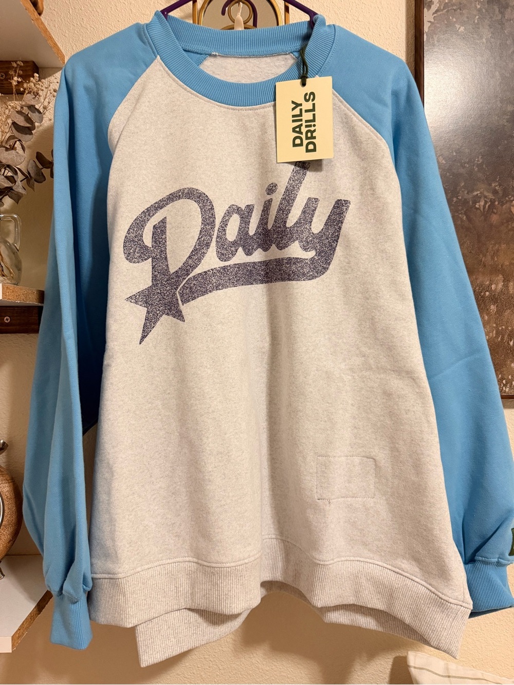 Daily Drills Blue and Cream Raglan Crewneck Sweatshirt with 'Daily' Graphic